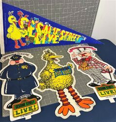 Pennant and banners from the original show. The Big Bird banner shown here, originally made for Ice Follies shows, would be repurposed for Sesame Street Live.
