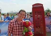 Rove with Elmo.