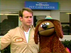 Breslauer as a Pet Care Center manager, about to apprehend  for not having an owner.