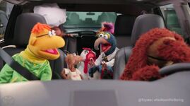 Rowlf driving a Toyota Highlander in Toyota commercials