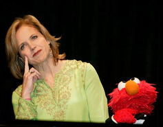 Katie Couric and Elmo