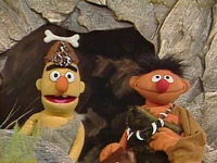Ernie, Bert, Sherlock and others in "Caveman Days" on Sesame Street