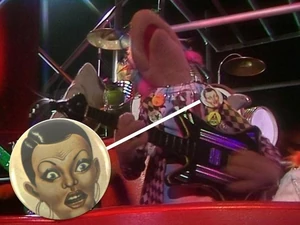 Debbie Harry's guitar player wears a Rocky Horror button on The Muppet Show