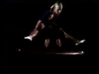 'Over' and 'Under' She vaults over one pommel horse, rolls under another one, then repeats everything in slow motion. (First: Episode 0517)