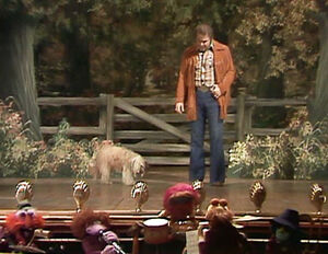 A live dog as Muppy in ""