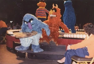 Herry Monster, Frazzle, Ernie, and Cookie Monster performing "