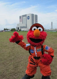 ElmoOutsidetheNASABuilding.jpg (342 KB) Elmo outside the shuttle hangar