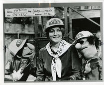 Judy Collins with Biff and Sully during a taping of an episode of Sesame Street.