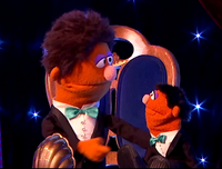 An Anything Muppet performs a comedy routine with a dummy (made from a Little Anything Muppet) in The Furchester Hotel episode, "The Furchester Talent Show."