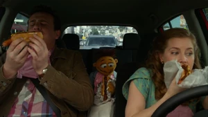 Gary, Mary and Walter chow down on some dogs in .