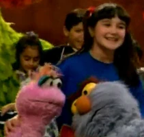 Dulce María as a child with Lola and Pancho in "Palomita Blanca."