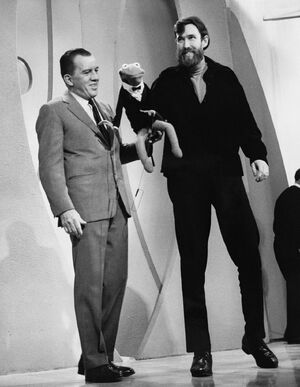 Jim Henson and Kermit appear onstage with Sullivan, taking their curtain call during the Muppets' January 15, 1967 appearance.