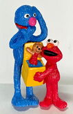 Grover startled by Elmo's Jack-in-the-Box 1998