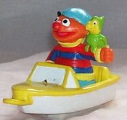 Ernie as a pirate in a boat