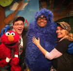 Chris Knowings as a spider with puppeteers Ryan Dillon (Elmo) and Leslie Carrara-Rudolph