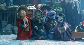 As a caroler during "Scrooge" in The Muppet Christmas Carol