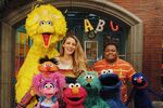 Blake Lively with Elmo, Ernie, Abby, Big Bird, Rosita, Cookie Monster, Chris and Grover