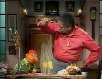 Dizzy Gillespie plays with a marionette in the cold open of episode 413 of The Muppet Show.