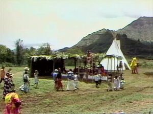 1095 wide shot shows Big Bird, teepee, indigenous people