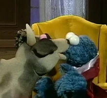 Cookie Monster & a cowMonsterpiece Theater