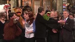 Huntsman (right) with Jason Segel & the Muppets on Saturday Night Live in 2011.