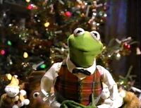 Fozzie performs finger puppets in bumpers for the original broadcast of A Muppet Family Christmas.