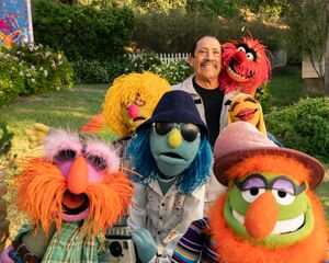 Danny Trejo with the Electric Mayhem band on the set of The Muppets Mayhem.