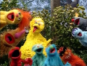 Big Bird celebrates Monster Day with friends.