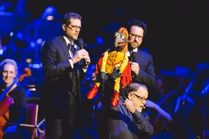Giacchino (left) with Gonzo (performed by Dave Goelz, center) and  (right)