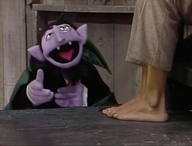 Muppet feet, Coleen gave me a whole bunch of toe socks and …