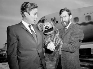 Dean, , and  pose in front of an American Airlines plane at the Nashville Municipal Airport on October 26, 1964.
