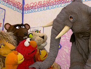 The Elephant in hand puppet form as seen in Elmo's World: Wild Animals.