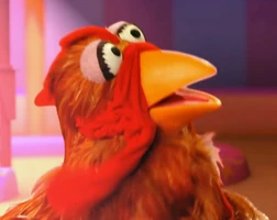 A chickensinging voiced by Audra McDonald Elmo the Musical: Circus the Musical