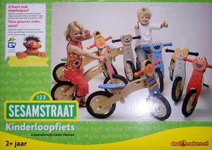 A box with some of the walking-bikes on it