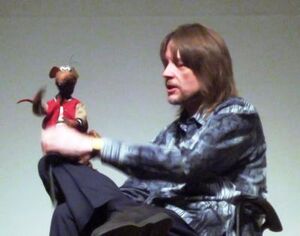 Whitmire performing Rizzo the Rat.