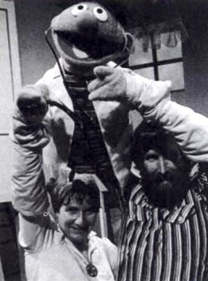 Jim, with Jane at right hand, performing .