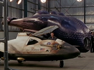 Lo'La and  in an  hangar on  in ""