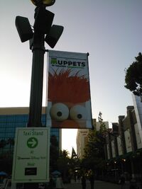 Lamppost banner for The Muppets in the Downtown Disney district, November 2011.