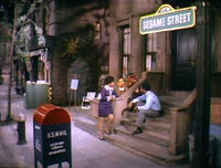 A view of the street before it curved at the arbor, from the very first episode.