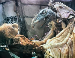 SkekTek about to drain a Podling of its essence.