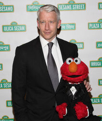 Anderson Cooper with Elmo at a 2008 Sesame Workshop fund-raiser.