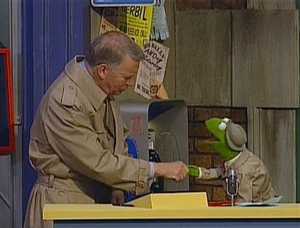 Kermit the Frog (seen here with ) makes his first new appearance on the show since 1990, covering the events of the moon trip in  and .