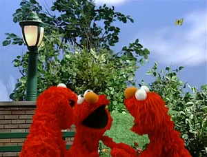 Dorothy imagines a bunch of Elmos playing Ring Around the Rosie.