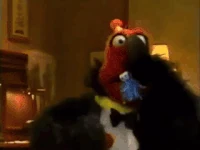 Telly blows a party favor in Sesame Street Episode 3145