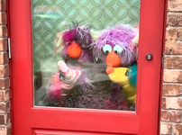 In a special video produced for Sesame Street at SeaWorld, the Two-Headed Monster plays with sock puppets.