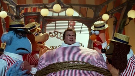 Rowlf, Sam, Link, and Beaker shrink Jack Black's head in "Smells Like Teen Spirit" from The Muppets.