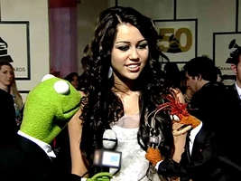 Miley Cyrus with Kermit and Pepe on Disney Xtreme Digital.