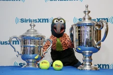 Gonzo with the US Open Women's and Men's Singles trophies