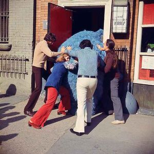 Thog getting stuck in the doorway to  on East 67th Street.