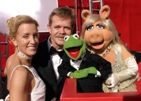 Macy and Huffman with Kermit and Piggy on the red carpet.